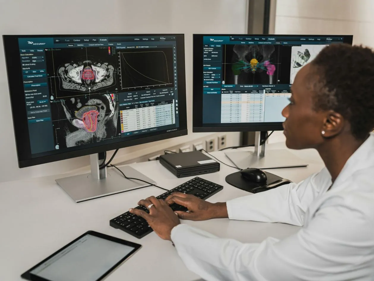 Radiology monitors showing scans