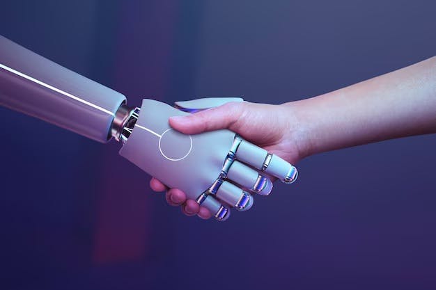 robot-handshake-human-background-futuristic-digital-age_53876-129770 (1).jpeg